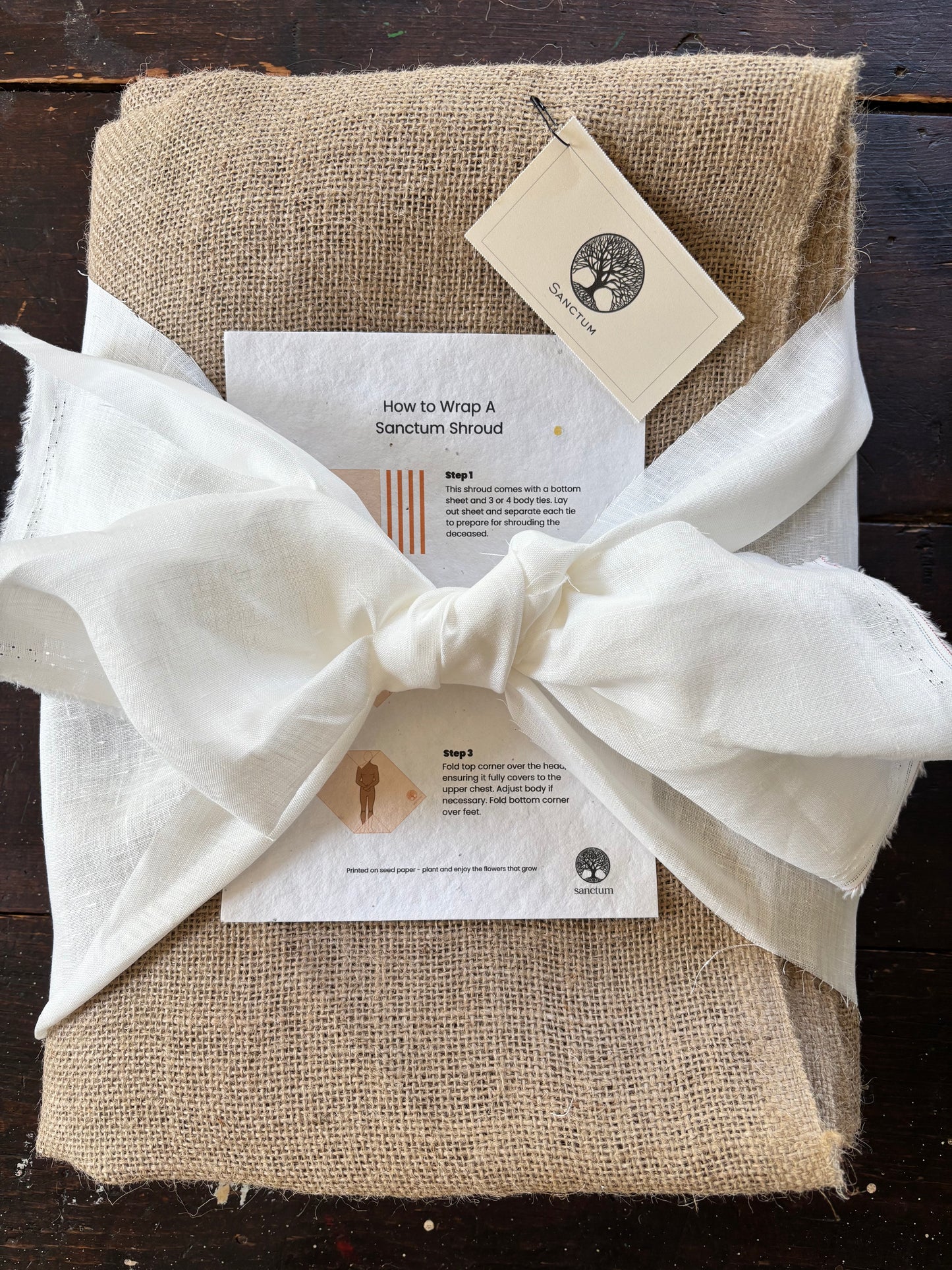 Burlap burial shroud with white hemp ties